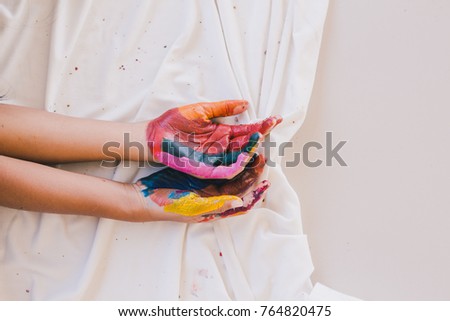 Education , Art and creativity learning concept - colourful hands painting 