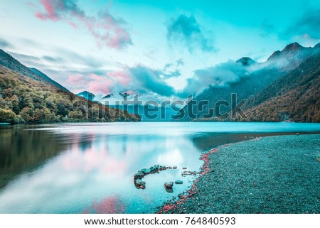 Lake Gunn at sunrise with reflections, Fiordland, South Island, New Zealand