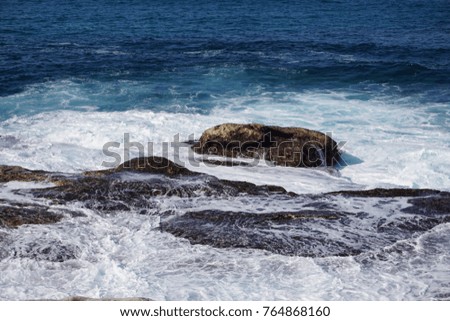 bule sea and stone