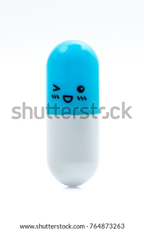 Cute capsule pills isolated on white background. Pharmacy drugstore background. Blue-white capsule pills. Pharmacy shop. Global healthcare concept. Pharmaceutics concept. Healthy and happy life.