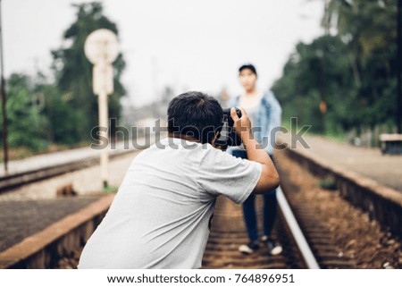 Photographer working with model.selective focus.