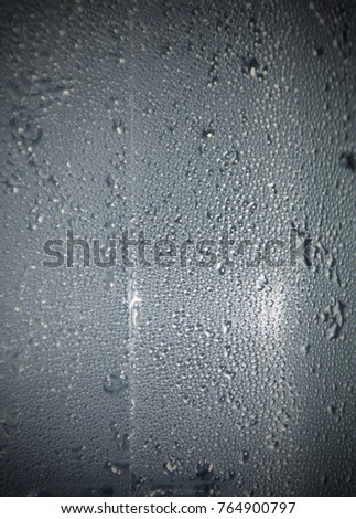 Fresh water drops on a glass surface. This photo was taken in Brisbane, Australia. 