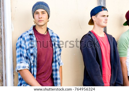 Teenage friends standing at the street