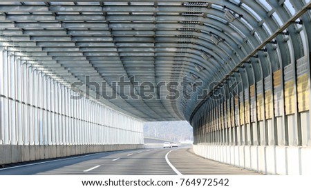 Cars exiting the overpass