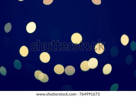 
Shiny christmas lights on black and white background with flash lights and christmas lights.