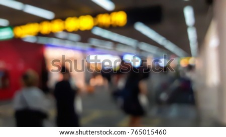 Blur crowd passenger walk in the airport