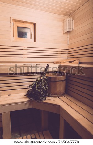 Equipment for sauna in light wooden cozy interior. Toned.