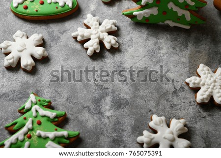 Sweet holiday cookies on gray background
