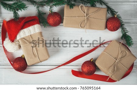 a Christmas still life. gift boxes on white wooden background with copy space