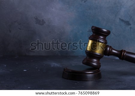 Law and justice concept - law gavel on gray background
