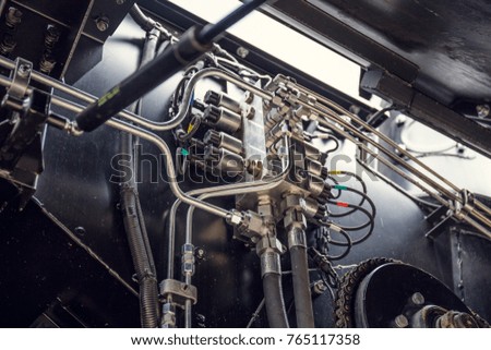 Harvester engine part, mechanisms of new modern technology combine vehicle motor with metal, chrome, heavy agricultural industry equipment, toned