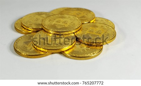 Rotating Stack Of Gold Bitcoins On Turntable.