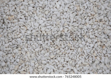 Small white pebble stones with center focus