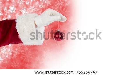 Digital composite of Santa holding bauble decoration and Snowflake Christmas pattern and blank space