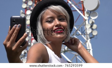 Woman Taking Selfie At Cell Tower
