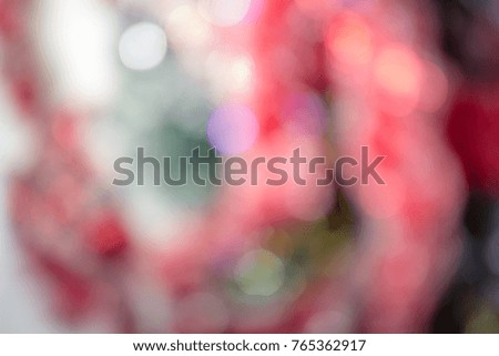 Red blurred christmas and new year glitter background.