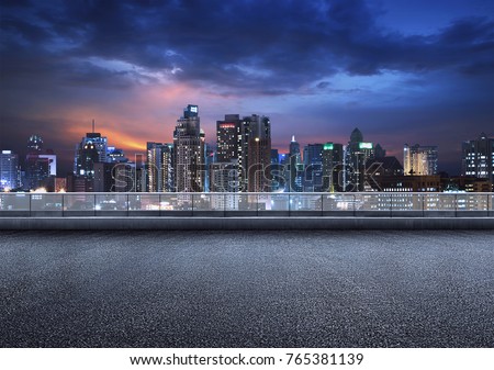 Empty floor platform with night view city skyline background Royalty-Free Stock Photo #765381139