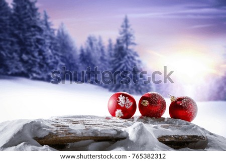 christmas balls and winter landscape 