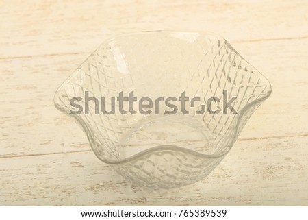 Empty plate for home or restorant over wooden background