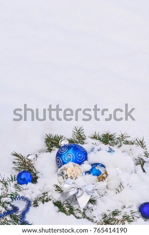 Blue christmas balls  branch with copy space. Holiday greeting card. Beautiful blue Christmas decorations 