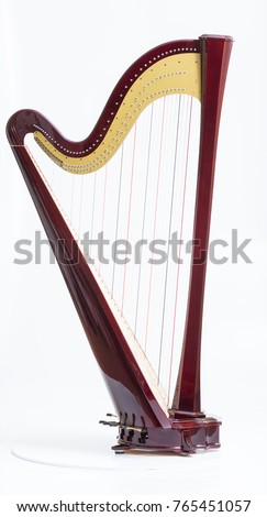Classical music instrument. Pedal harp Royalty-Free Stock Photo #765451057