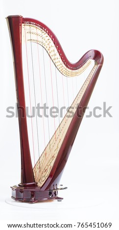 Classical music instrument. Pedal harp Royalty-Free Stock Photo #765451069
