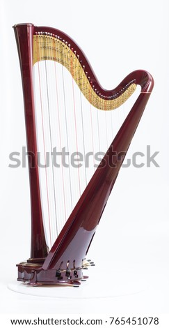 Classical music instrument. Pedal harp Royalty-Free Stock Photo #765451078