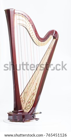 Classical music instrument. Pedal harp Royalty-Free Stock Photo #765451126
