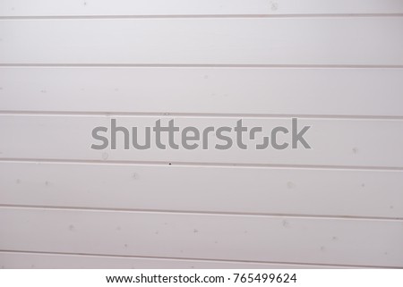 White blurred background pattern of wood. Space for text. Lines.