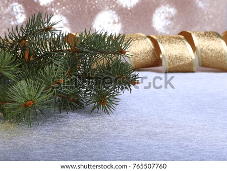 decoration with christmas tree on a blurry, sparkling and fabulous background.