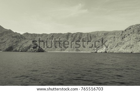 Pirate's lair in the Gulf of Oman. Medieval view. Old style photo