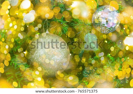 Yellow Abstract circular bokeh of  Green Christmas tree background.