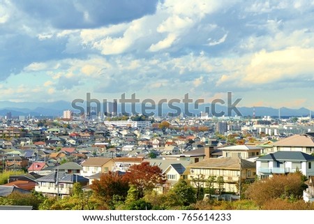 small town in Yokohama area with cityscape and mountain in background (Aobadai ares)