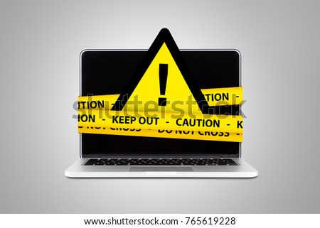 Yellow triangle warning sign with exclamation mark and caution tapes on computer, isolated on white background.
