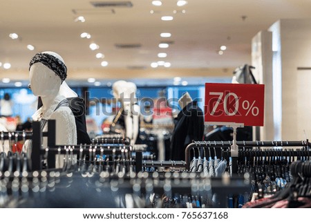 sale 70% off mock up advertise display frame setting over the clothes line in the shopping department store for shopping, business fashion and advertisement concept