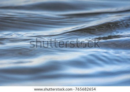 Movement of Water Surface and reflection,Wave water. Royalty-Free Stock Photo #765682654