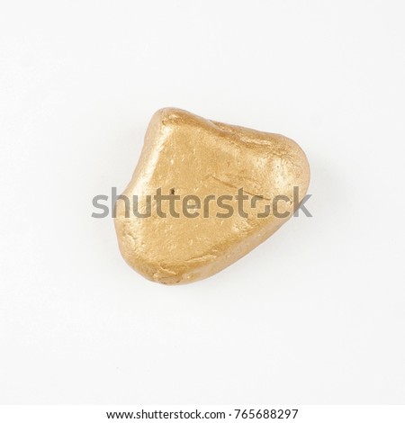 golden stone isolated on white background. gold cobblestone. greeting cards decoration.