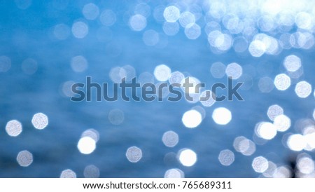 Sunlight sparkling on the water surface