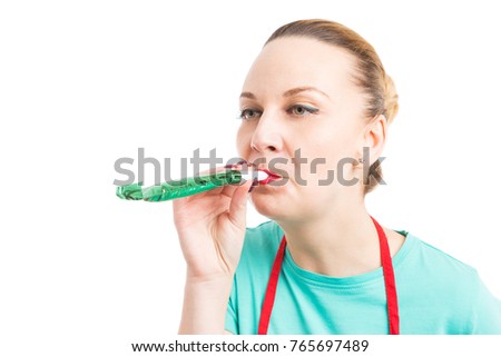 Woman blowing party whistle as celebration concept isolated on white background