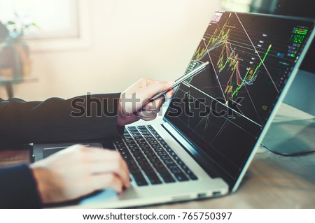 business people working with stock trading forex with technical indicator tool on laptop Royalty-Free Stock Photo #765750397