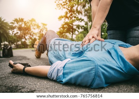 First Aid Emergency CPR on a Man who has Heart Attack or Shock , One Part of the Process Resuscitation - Healthcare Concept Royalty-Free Stock Photo #765756814