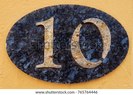 Number 10 House number on the wall ten