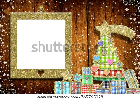 Christmas empty photo frame greeting card.  Christmas tree and gifts made with cheerful cuts of fabrics and golden glitter, gold glitter empy photo frame on old wooden wall.