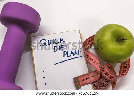 The Notepad with Diet Plan list text. DIET PLAN healthy eating, dieting, slimming and weigh loss concept. Healthy Lifestyle Diet Nutrition Concept