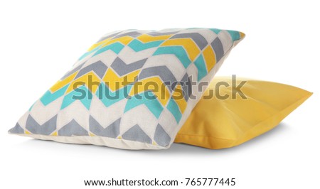 Soft colorful pillows, isolated on white Royalty-Free Stock Photo #765777445