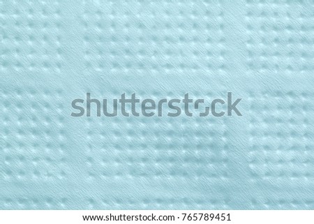 Paper napkin blue. Texture of paper with a relief pattern in a dot.