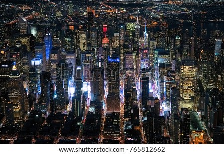 New York Aerial View over Midtown Manhattan Time Square at Night from a Helicopter