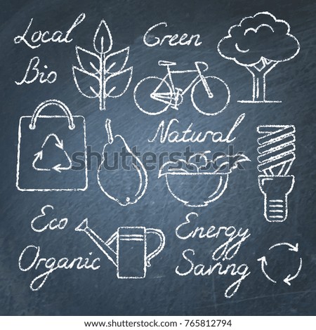 Collection of ecology icons and lettering on chalkboard. Bag with recycling symbol, watering can, energy saving bulb and other symbols isolated.