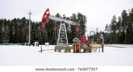 winter landscape. Oil pumps. Oil industry equipment. Frosty morning
