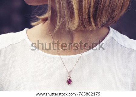 Luxury necklace with gem stone pendant  Royalty-Free Stock Photo #765882175